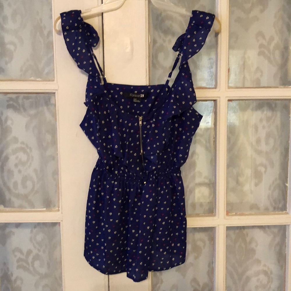 Navy top with flounce sleeves.